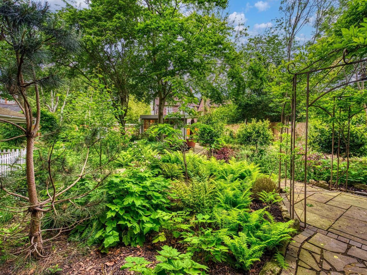 Holiday home Garden In Hidden Oasis Pass The Keys *