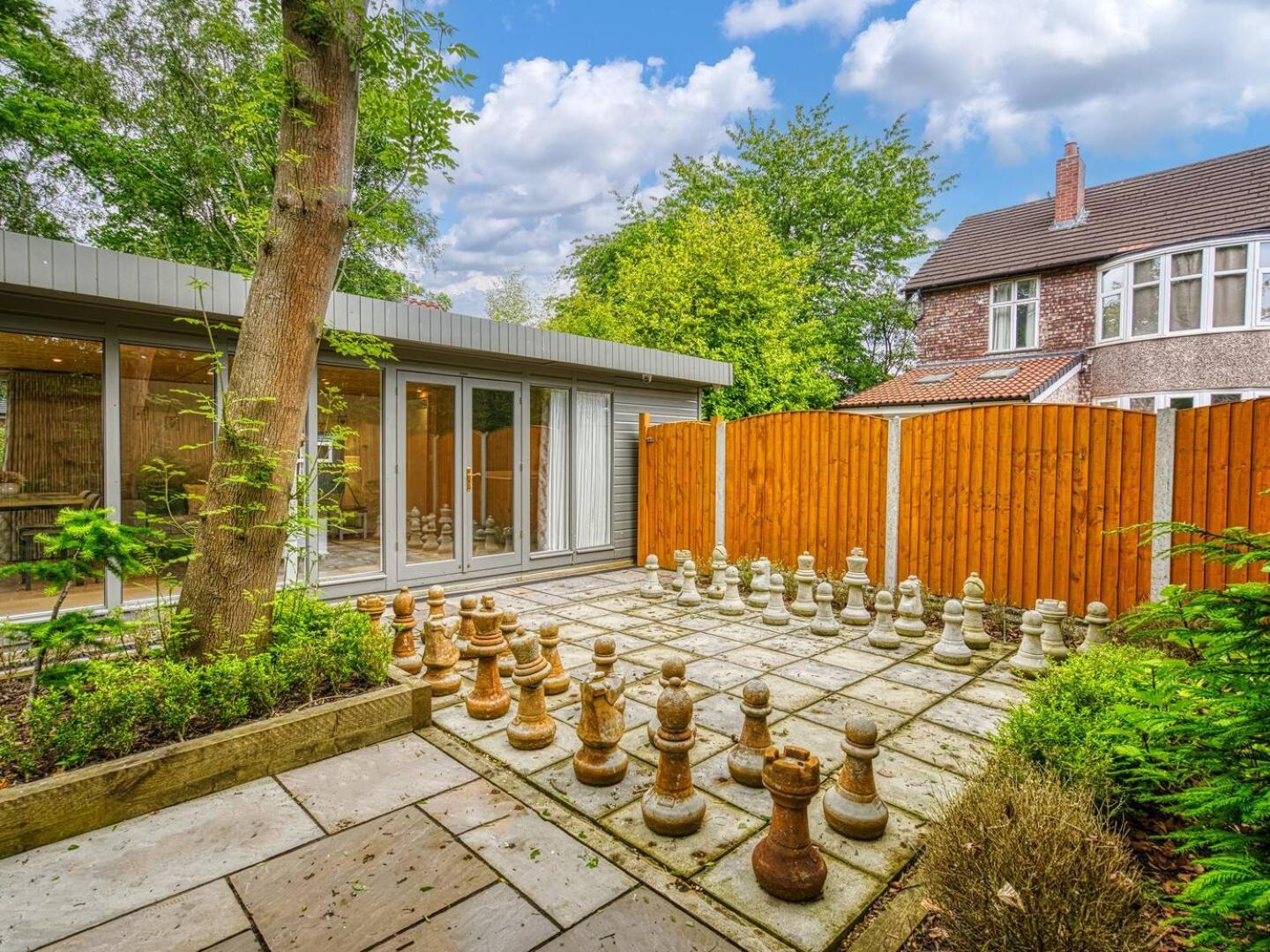 Holiday home Garden In Hidden Oasis Pass The Keys Manchester